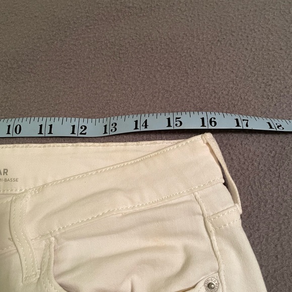 Old Navy Rockstar Mid-Rise White Distressed Skinny Jeans Size 12 - Picture 9 of 12